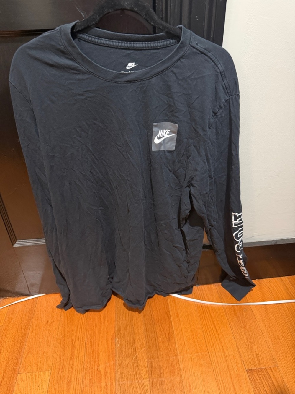 Nike Black Long-Sleeve Logo Shirt with Sleeve Graphic